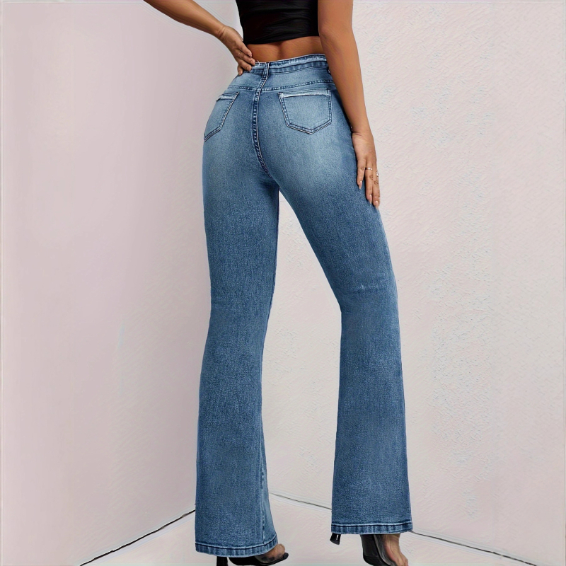 Jeansi cu talie înaltă, croială bootcut, buzunare cu margini nefinisate, denim cu 50–70% bumbac, uzură manuală