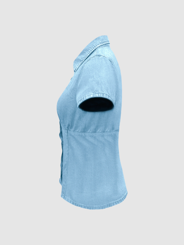 Ženska slim-fit denim košulja s kratkim rukavima, uskog kroja, prednje kopčanje na gumbe, mješavina denima i pamuka (70–80% denim, 50–70% pamuka), duljina 50–65 cm, proljeće 2026