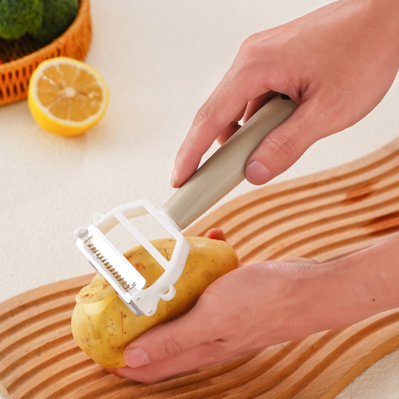 Višenamjenski kuhinjski alat: dvostruka glava rende i rezač dinje; tijelo od nehrđajućeg čelika, plastični dijelovi