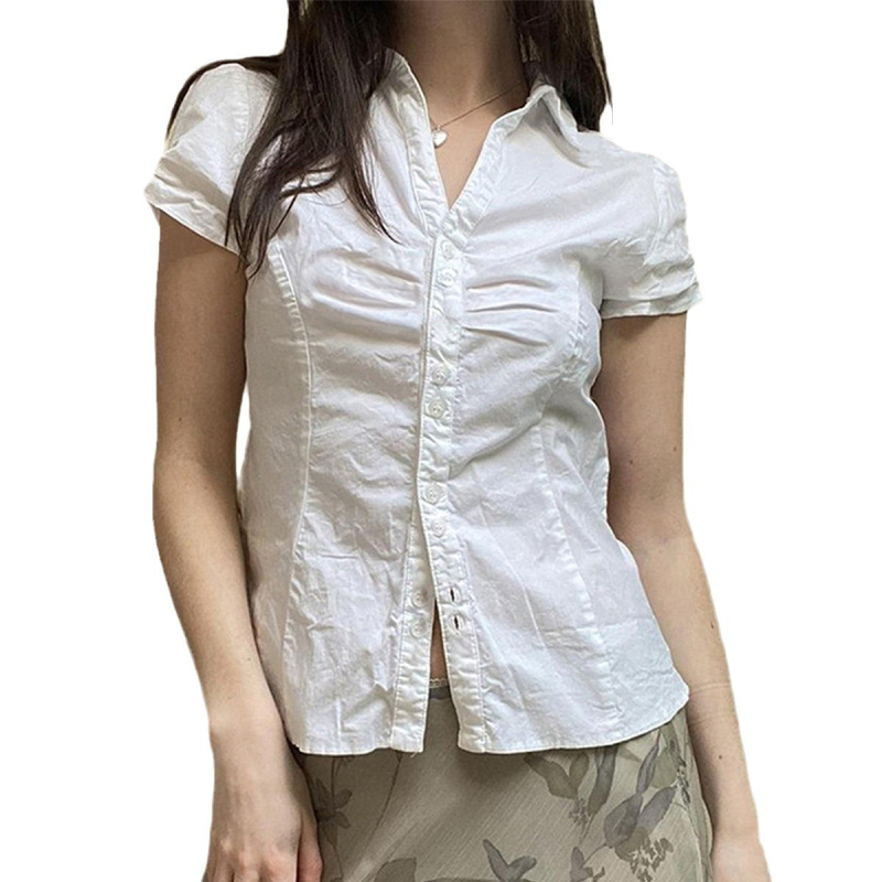 Slim-fit košulja od poliestersko-bavlane smjese, kratkih rukava s puff rukavima, ovratnik košulje, jednobojna