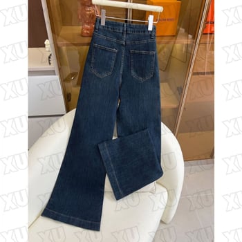 Traperice s visokim strukom, široke nogavice, debeli denim, dugački kroj, proljeće 2025