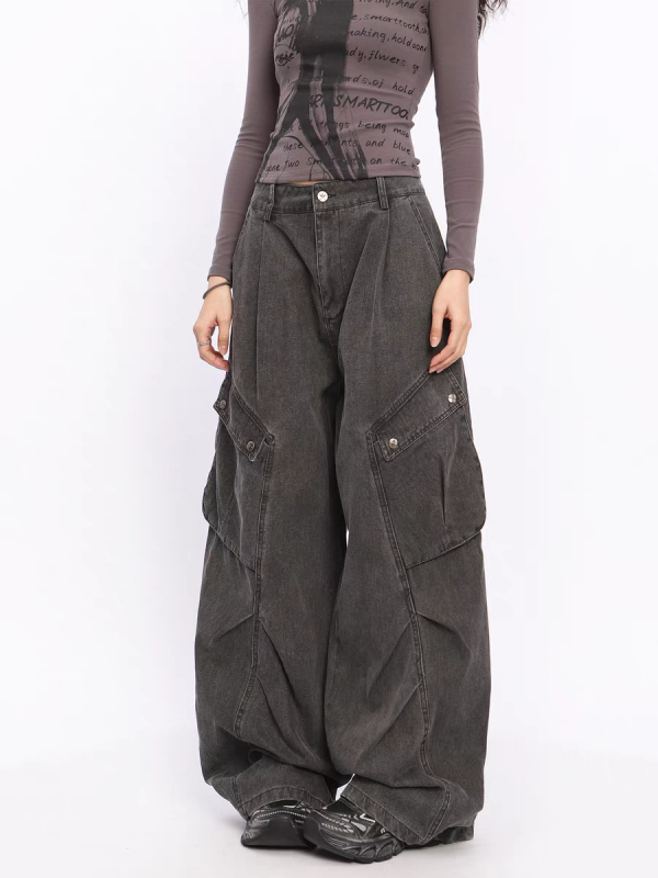 Traperice visokog struka, širokih nogavica, velikih džepova (denim, pamuk 30-50%, duljina do poda)