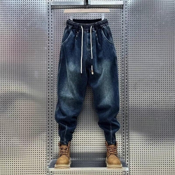 Férfi farmer nadrág, lazább szabás, középső derekú, Cowboy poliészter anyag (Tavasz 2025)