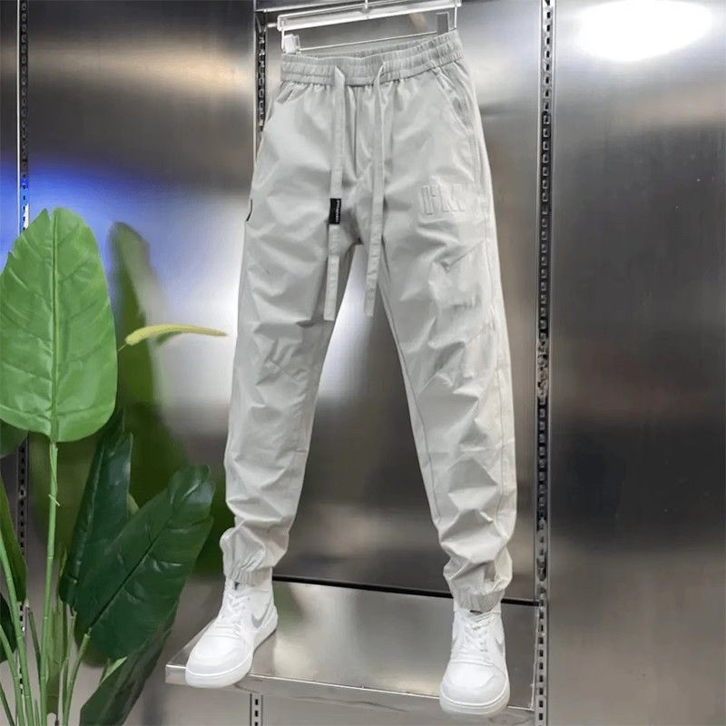 Muške casual hlače jogger - prozračni poliester, Jacquard otisak s slovima, srednji pojas, kratka duljina, uske manžetne