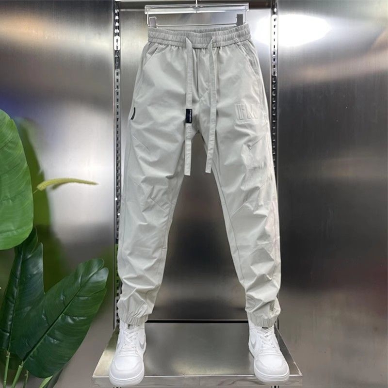 Muške casual hlače jogger - prozračni poliester, Jacquard otisak s slovima, srednji pojas, kratka duljina, uske manžetne
