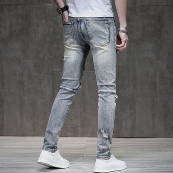 Muške slim-fit traperice od denima s distressed efektom i raw rubom, 90% pamuk, elastičan materijal, srednji pojas, zatvarač, višestruke džepove