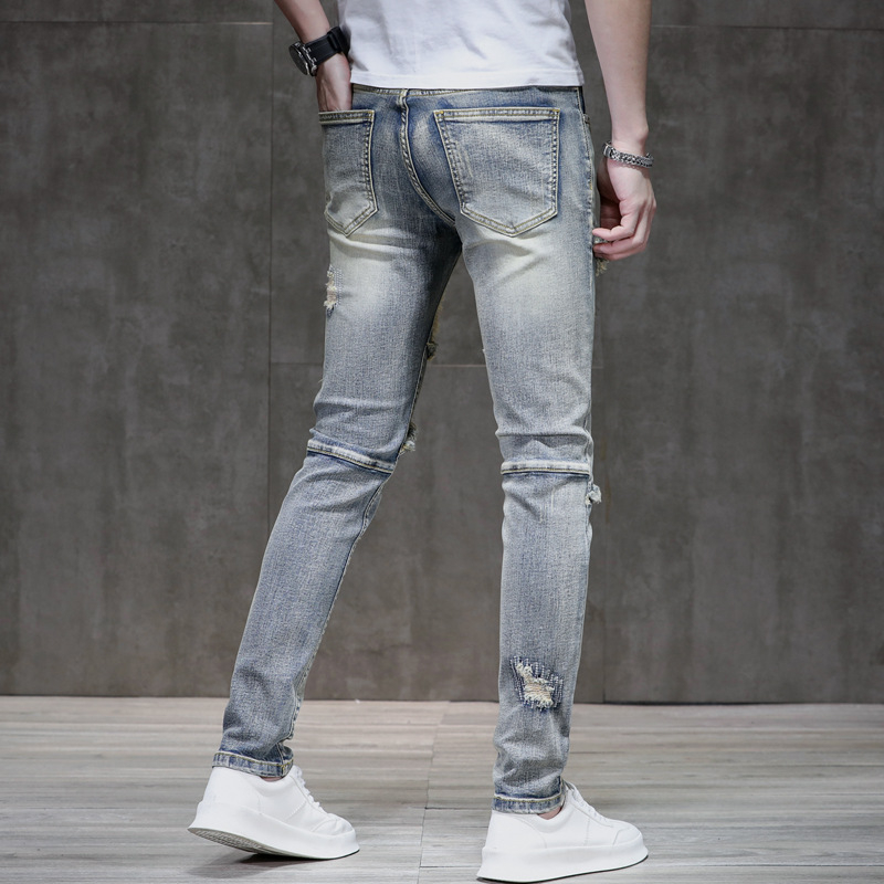 Muške slim-fit traperice od denima s distressed efektom i raw rubom, 90% pamuk, elastičan materijal, srednji pojas, zatvarač, višestruke džepove