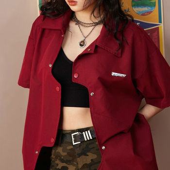 Ženska košulja s kratkim rukavima, nepravilnog kroja, poliester, polo ovratnik, kopčanje na jedan red