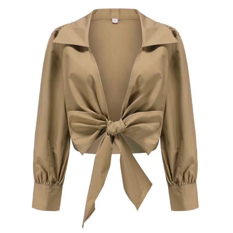 Ženska bluza s V izrezom i prekriženim trakama sprijeda, rukavi u stilu fenjera, šifon-poliester materijal, kratka duljina, gradski stil