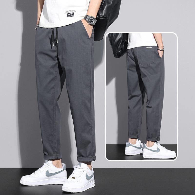 Muške casual hlače, stil japanskog workweara, opuštena silueta, skraćena dužina, srednji pojas, mikroelastičnost