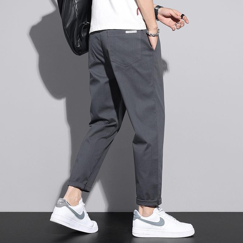 Muške casual hlače, stil japanskog workweara, opuštena silueta, skraćena dužina, srednji pojas, mikroelastičnost