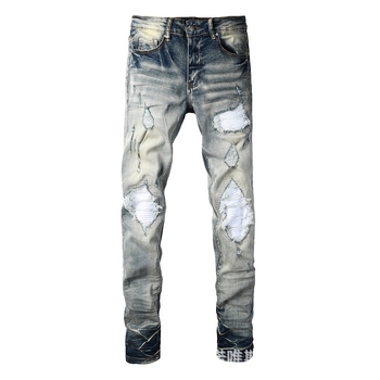 Traperice s poderotinama i graffiti zakrpama, uski kroj, rastezljivi denim
