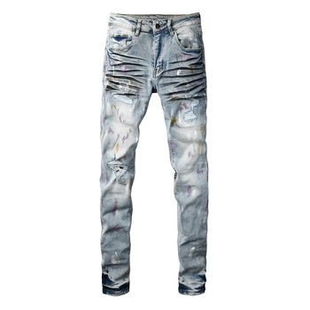 Traperice s poderotinama i graffiti zakrpama, uski kroj, rastezljivi denim