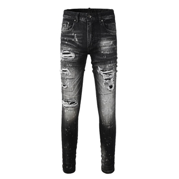 Traperice s poderotinama i graffiti zakrpama, uski kroj, rastezljivi denim