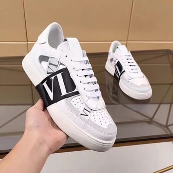 Unisex χαμηλά sneakers με δερμάτινο πάνω μέρος, καουτσούκ σόλα, κορδόνια, διαπνέουν, σχέδιο με γράμματα