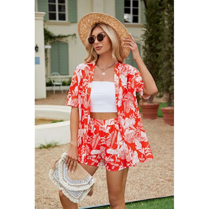 Női két darabos szett: rövid ujjú polo nyakú felső és elasztikus derekú rövidnadrág, virágmintás, poliészter, városi stílus
