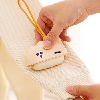 Rajzfilmszerű ragadós szőrmentesítő görgő - hordozható ruhákhoz, erős tisztítás