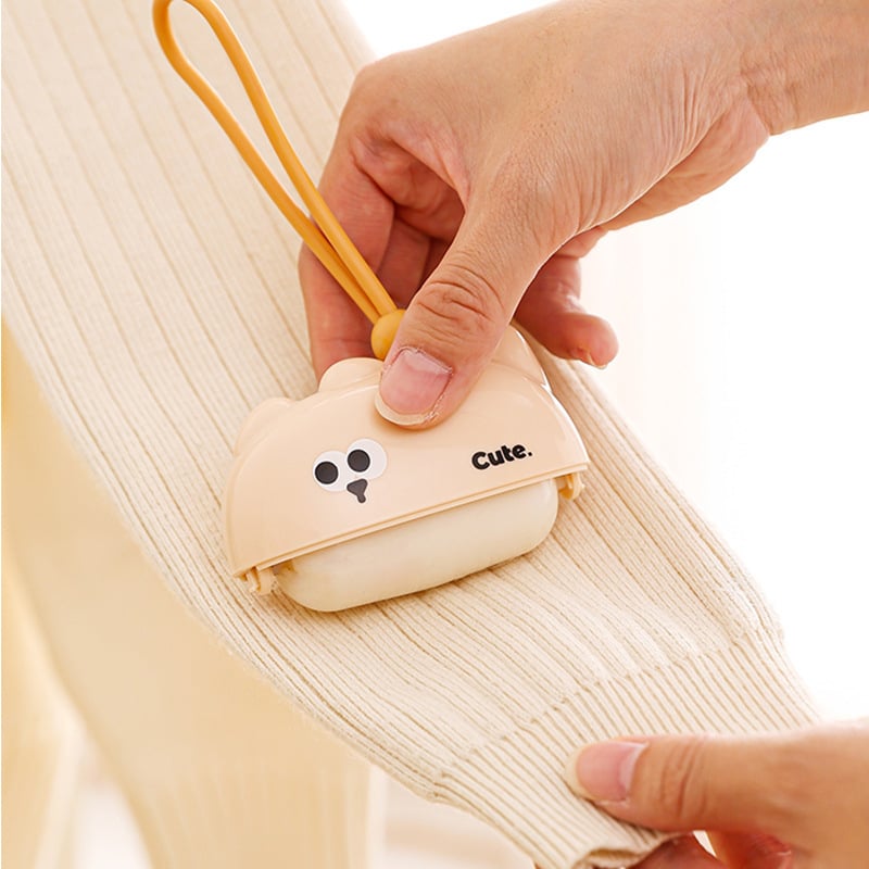 Rajzfilmszerű ragadós szőrmentesítő görgő - hordozható ruhákhoz, erős tisztítás