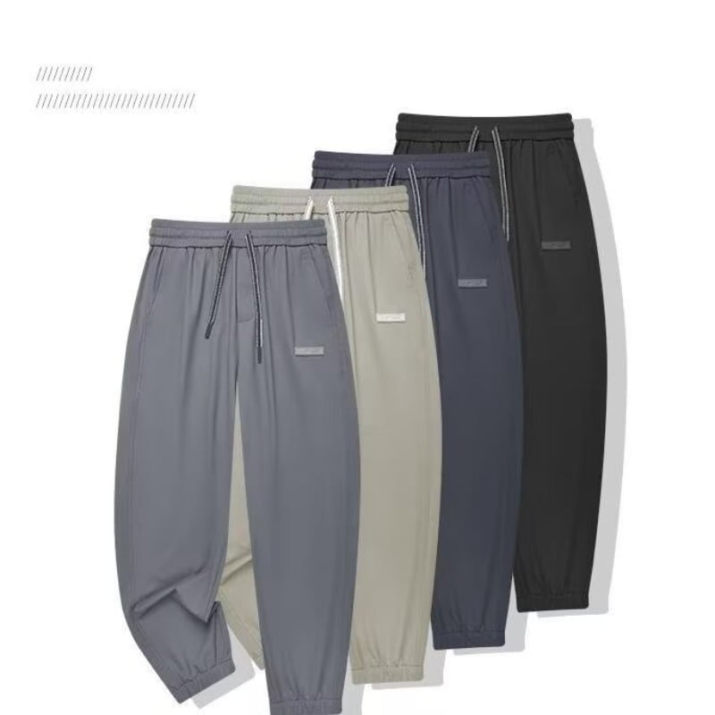 Férfi cropped jogger nadrág, laza szabás, középtalpú derék, poliészter anyag, mikroelasztikusság