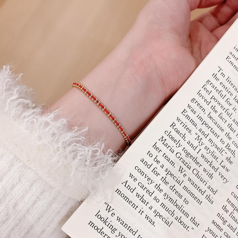 Női kötött zsinór karkötő, geometriai forma, kötési technika, könnyed luxus stílus, utazási emlék