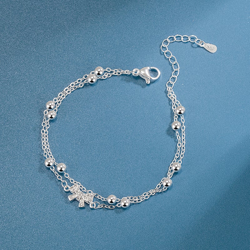 Női dupla rétegű masnis karkötő, réz, elektroplatált bevonat, motív állat/zodiákus