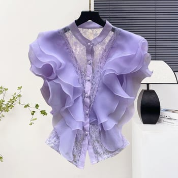 Csipke anyagú ing, álló gallérral, egy sor gombbal, rövid ujjú, egyenes szabású, hossz 50–65 cm, egyszínű modell, japán-koreai lazább stílus