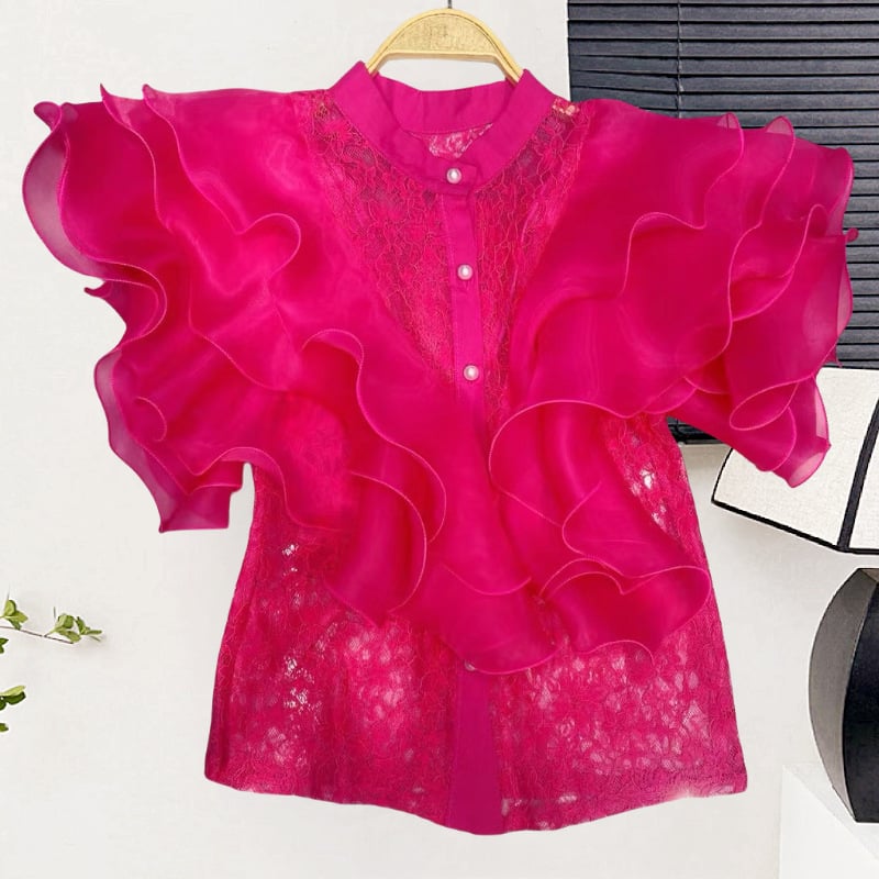 Csipke anyagú ing, álló gallérral, egy sor gombbal, rövid ujjú, egyenes szabású, hossz 50–65 cm, egyszínű modell, japán-koreai lazább stílus