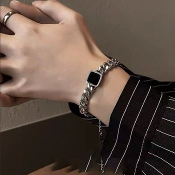 Karkötő titán acélból • Forma: rombusz • Stílus: uniszex, minimalist • Kategória: kézre szánt kiegészítő • Megjelenés: 2025 nyár