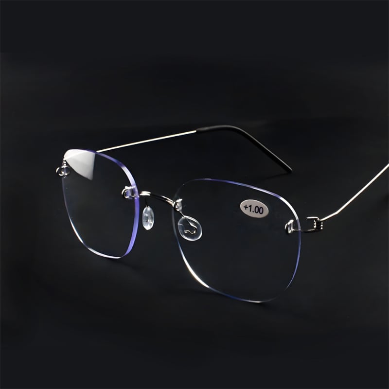 Keret nélküli olvasószemüveg fém kerettel, gyanta lencsékkel, anti-kék fény, kis arcra illeszkedik, dioptria +1.00-tól +3.50-ig.