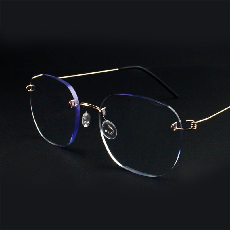 Keret nélküli olvasószemüveg fém kerettel, gyanta lencsékkel, anti-kék fény, kis arcra illeszkedik, dioptria +1.00-tól +3.50-ig.