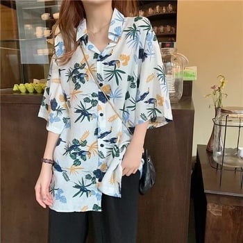 Poliészterből készült ing geometriai mintával, rövid ujjú, négyzetes gallér, lazán szabott, hossz 50–65 cm