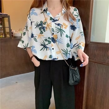 Poliészterből készült ing geometriai mintával, rövid ujjú, négyzetes gallér, lazán szabott, hossz 50–65 cm