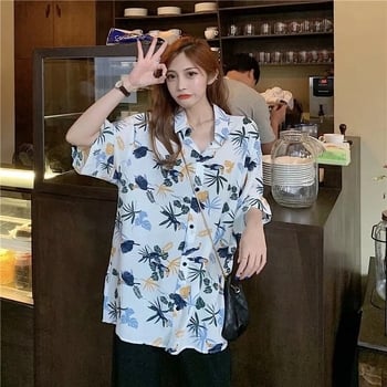 Poliészterből készült ing geometriai mintával, rövid ujjú, négyzetes gallér, lazán szabott, hossz 50–65 cm