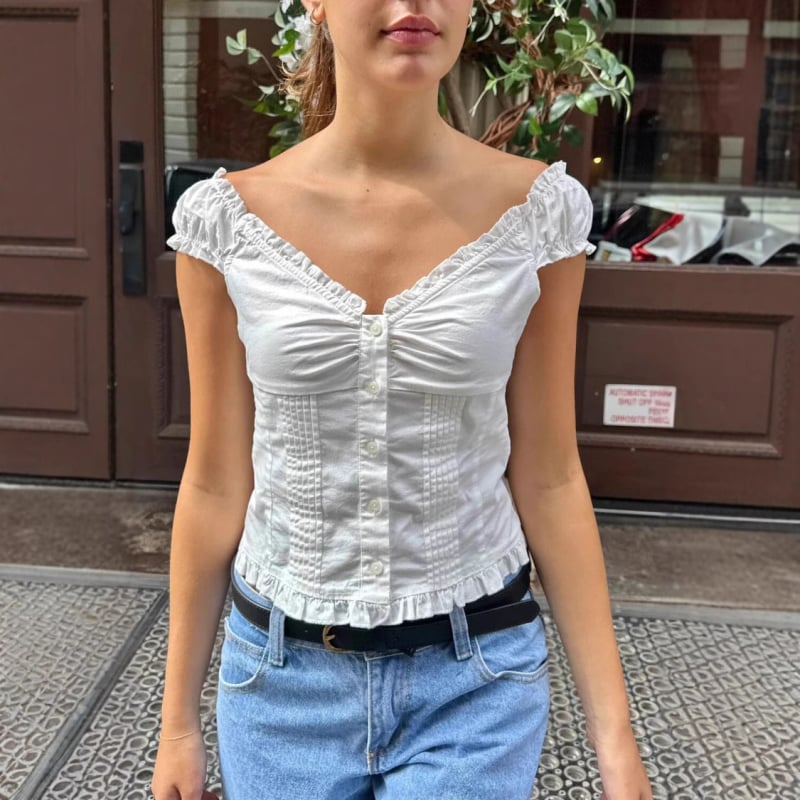 Cardigan-stílusú felső, karcsú szabás, rövid ujjú, V-nyakú, egyszínű poliészter 95% felett