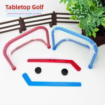 Set de jocuri de masă cu mingi: construcție din plastic; include mini fotbal, curling, tenis de masă și golf; ambalaj blister; potrivit pentru vârsta 15–35