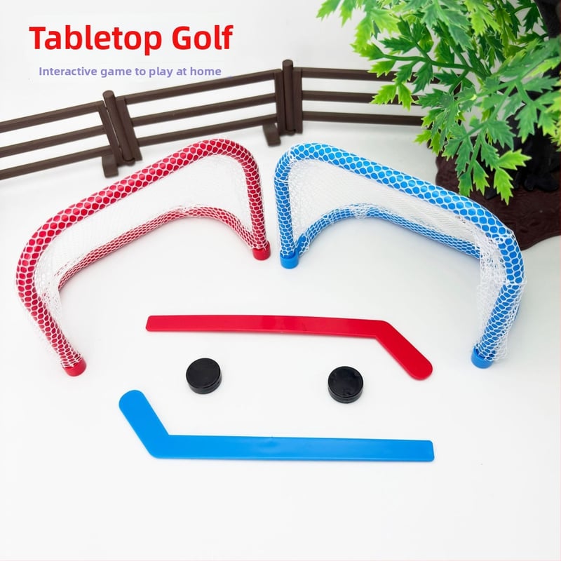 Set de jocuri de masă cu mingi: construcție din plastic; include mini fotbal, curling, tenis de masă și golf; ambalaj blister; potrivit pentru vârsta 15–35