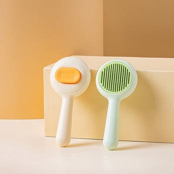 Macska- és kutyaápoló kefe a gubancok oldására és a szőr eltávolítására, kerek formájú kisállat-szőrkefe (Anyag: Műanyag; Termékkód: TQ-CW-093; Alkalmazható: Univerzális)