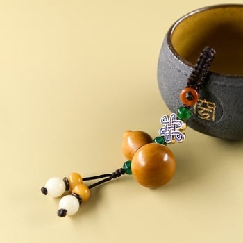 Autókulcs-gyűrű barackfa anyagból, Mu ran márka, modell 888