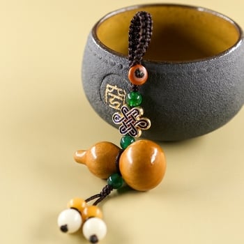 Autókulcs-gyűrű barackfa anyagból, Mu ran márka, modell 888