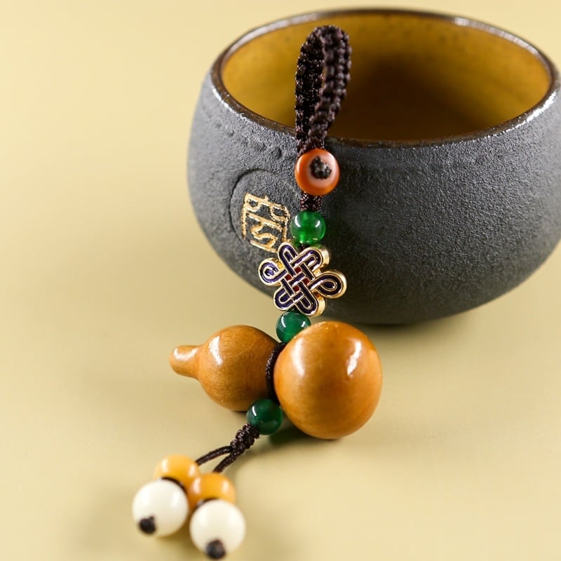 Autókulcs-gyűrű barackfa anyagból, Mu ran márka, modell 888