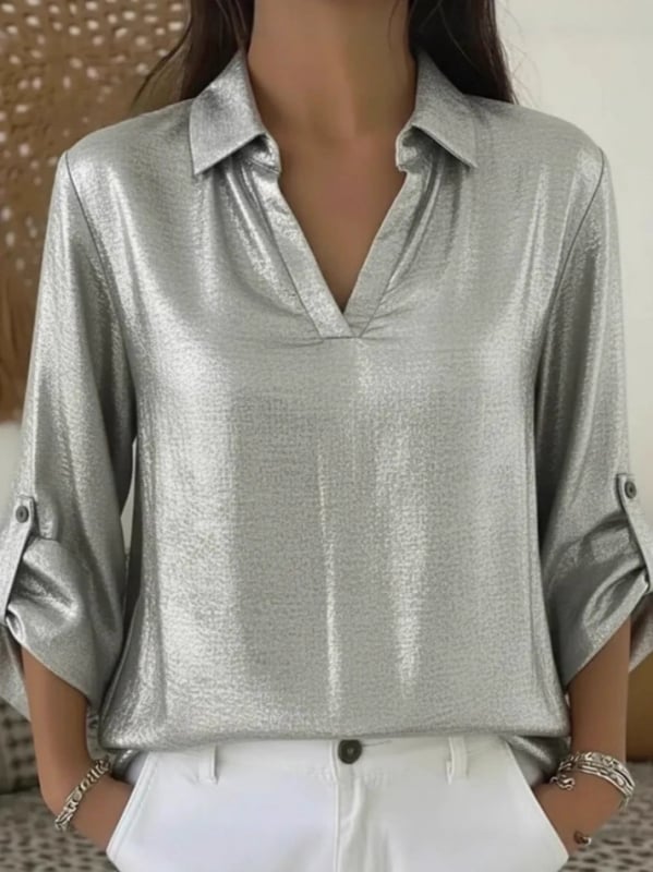 Szabadidős női blúz V-nyakú zsebbel, aranyszínű rész, poliészter-elasztán keverék, hosszú ujjú, egyszínű kivitel