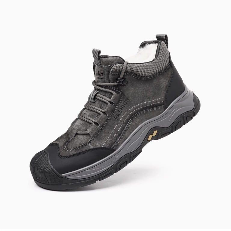 Férfi téli bőrből készült csizma gumírozott talppal, szőrme béléssel, csúszásmentes