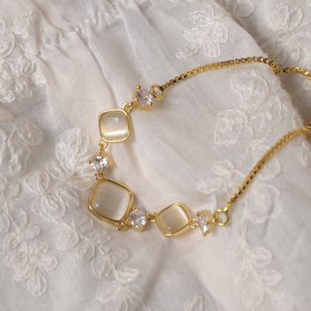 Női karkötő geometríkus rombusz formájú macskaszem kővel, réz alapanyag, elektroplatírozás, kiváló dizájn