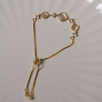 Női karkötő geometríkus rombusz formájú macskaszem kővel, réz alapanyag, elektroplatírozás, kiváló dizájn