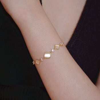 Női karkötő geometríkus rombusz formájú macskaszem kővel, réz alapanyag, elektroplatírozás, kiváló dizájn