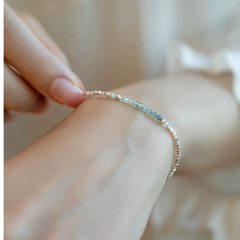 Akvamarin köves karkötő, geometriai design, elektroplattolt felület, női divat