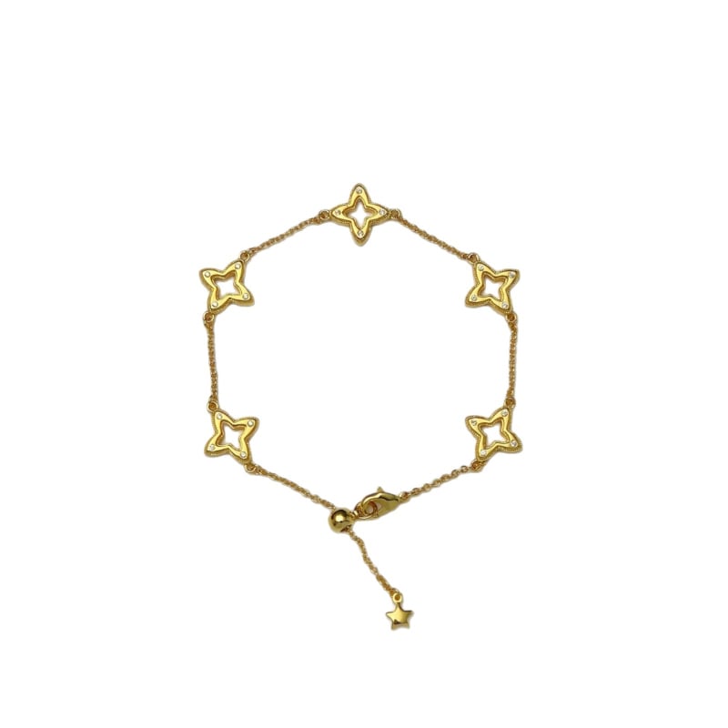 Női vintage karkötő csillag és négylevelű lóhere motívumokkal, aranyozott kivitel, Seiko technika, kézre való kiegészítő