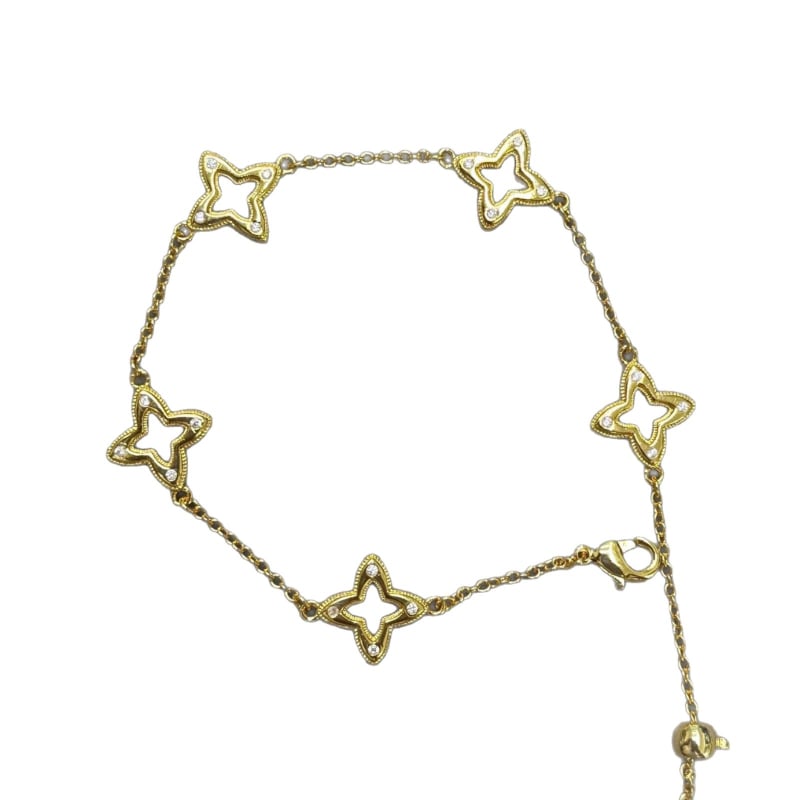 Női vintage karkötő csillag és négylevelű lóhere motívumokkal, aranyozott kivitel, Seiko technika, kézre való kiegészítő