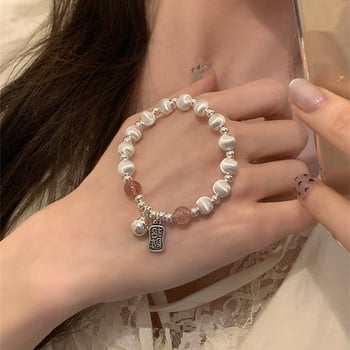 Réz karkötő elektroplattázott felülettel, Laser-brushed golyók, Strawberry Crystal kövekkel, nőknek, könnyű luxus stílus