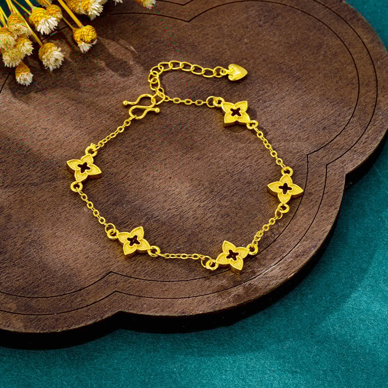 Női karkötő négyágú csillag motívummal, aranyozott réz, elektroplating technika, retro stílus, 2025 tavasz